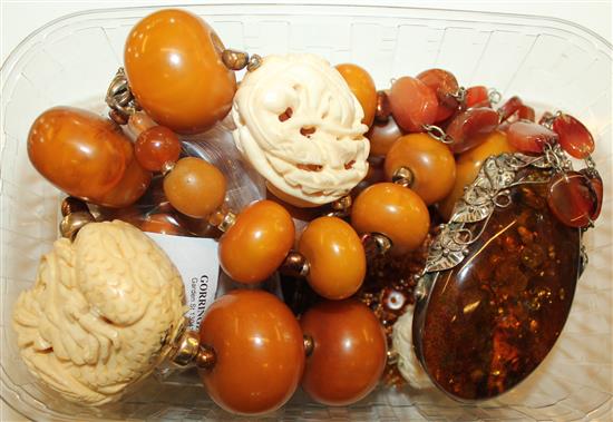 Quantity of costume necklaces including amber and carved ivory